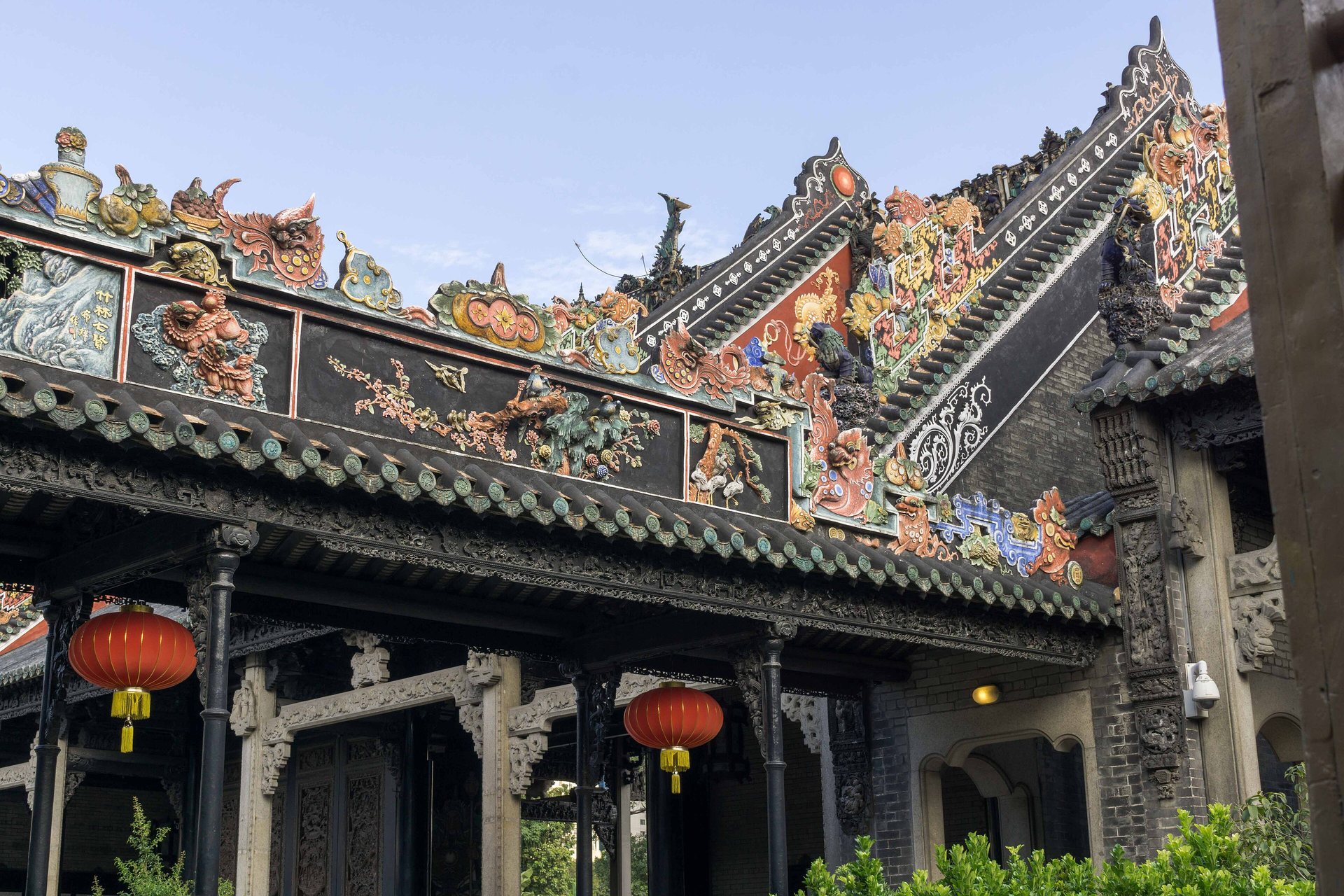 Upward-sweeping decorated roof ridges at Chen Clan Ancestral Hall in Guangzhou