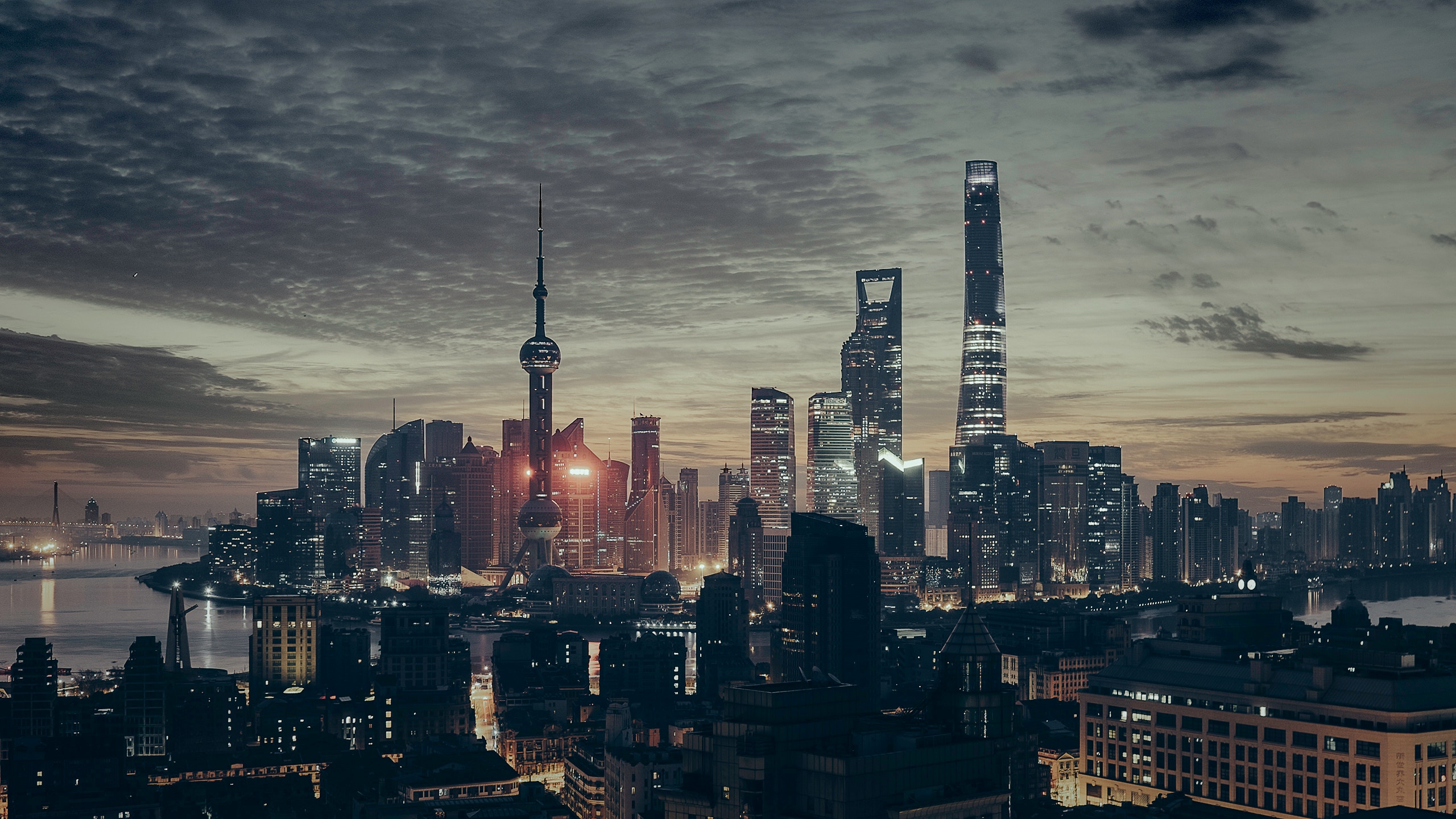 Shanghai's Pudong skyline and Huangpu River at dusk