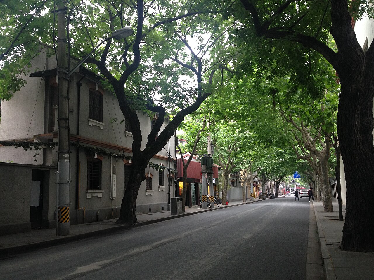 Tree-lined Wukang Road with low-rise historic residences