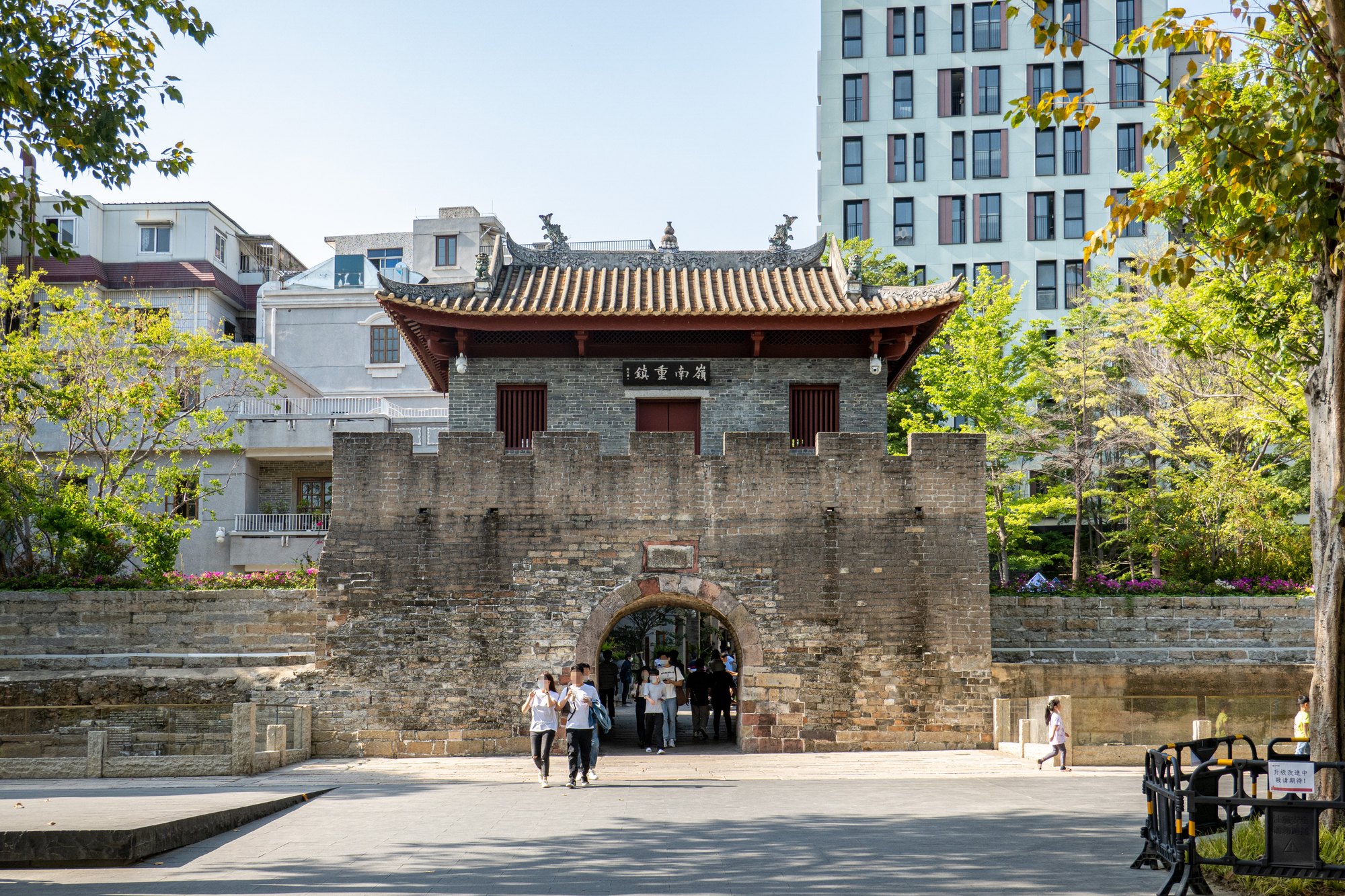 Nantou Ancient City south gate with contemporary buildings behind it